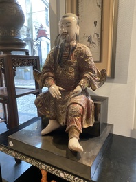A large Chinese lacquered and polychromed wood sculpture of Guandi, 18th C.