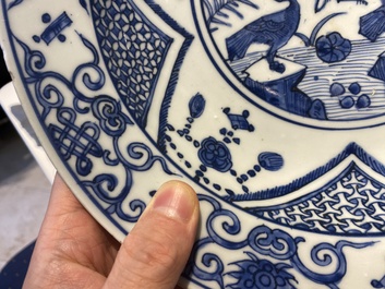 A Chinese blue and white 'cranes' dish, Fu Gui Jia Qi 富貴佳器 mark, Jiajing/Wanli