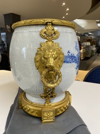 A large Chinese blue and white crackle-glazed 'carps' vase with fine gilt bronze mounts, 18/19th C.