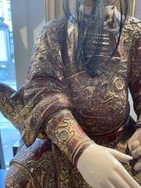 A large Chinese lacquered and polychromed wood sculpture of Guandi, 18th C.