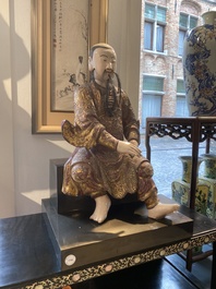 A large Chinese lacquered and polychromed wood sculpture of Guandi, 18th C.