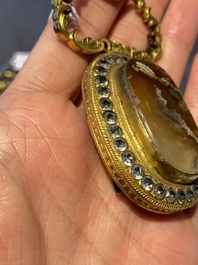 A pair of Chinese gilt-bronze belt ornaments with moss agate, Qianlong