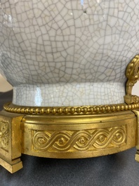 A large Chinese blue and white crackle-glazed 'carps' vase with fine gilt bronze mounts, 18/19th C.
