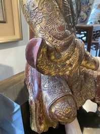 A large Chinese lacquered and polychromed wood sculpture of Guandi, 18th C.