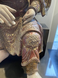 A large Chinese lacquered and polychromed wood sculpture of Guandi, 18th C.