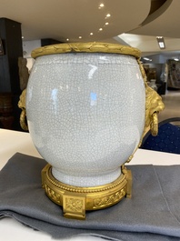 A large Chinese blue and white crackle-glazed 'carps' vase with fine gilt bronze mounts, 18/19th C.