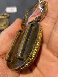 A pair of Chinese gilt-bronze belt ornaments with moss agate, Qianlong