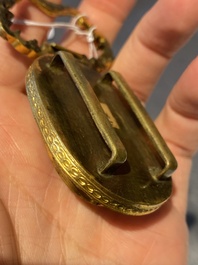 A pair of Chinese gilt-bronze belt ornaments with moss agate, Qianlong