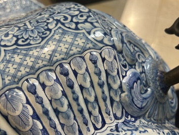 A massive Dutch Delft blue and white cistern and cover, 1st half 18th C.