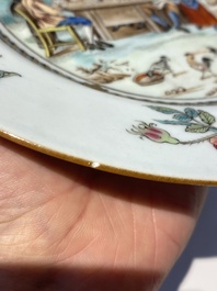 A pair of Chinese famille rose plates with peasants playing cards in the style of the painter David Teniers II, Qianlong