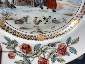 A pair of Chinese famille rose plates with peasants playing cards in the style of the painter David Teniers II, Qianlong