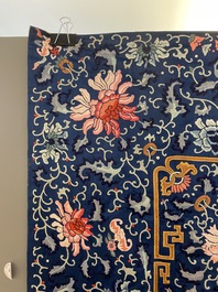 A Chinese blue-ground embroidered silk throne cushion cover, 18/19th C.