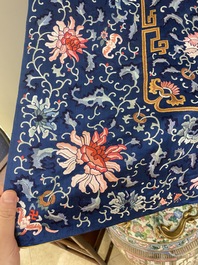 A Chinese blue-ground embroidered silk throne cushion cover, 18/19th C.