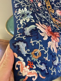 A Chinese blue-ground embroidered silk throne cushion cover, 18/19th C.