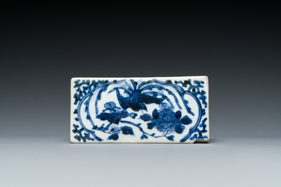 A pair of Japanese blue and white plates and a rectangular pounce pot, Arita, Edo, 18th C.