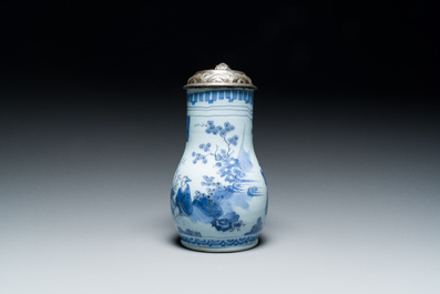 A Dutch Delft blue and white chinoiserie jug with silver lid, 17th C.