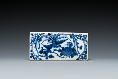 A pair of Japanese blue and white plates and a rectangular pounce pot, Arita, Edo, 18th C.