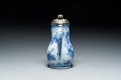 A Dutch Delft blue and white chinoiserie jug with silver lid, 17th C.