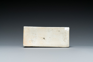 A pair of Japanese blue and white plates and a rectangular pounce pot, Arita, Edo, 18th C.