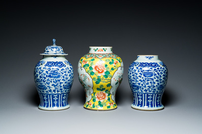 Three Chinese blue, white and famille verte vases, 19th C.