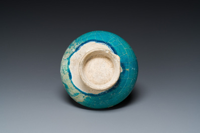 A turquoise-glazed jug, Kashan, Persia, 13th C.