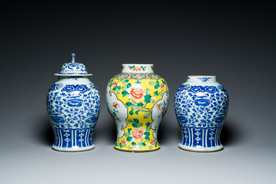 Three Chinese blue, white and famille verte vases, 19th C.