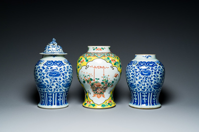 Three Chinese blue, white and famille verte vases, 19th C.