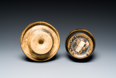 An Etruskian 'aryballos' portrait ewer and a 'patera' dish with black geometrical design, 4th C. b.C.