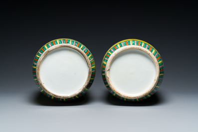 A pair of Chinese yellow-ground famille verte rouleau vases, 19th C.
