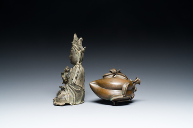 A Chinese bronze Buddha and a peach-shaped incense burner, Ming and Qing