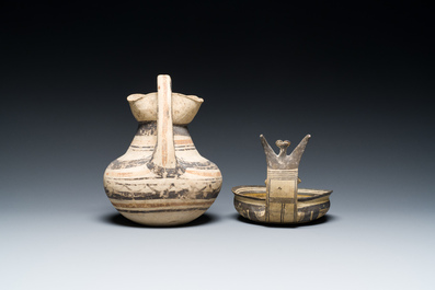 A polychrome Greek pottery 'oinochoe' ewer and a geometrically decorated Daunian pottery bowl, Southern Italy, 6th/3rd C. b.C.