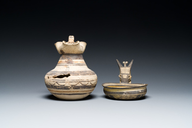 A polychrome Greek pottery 'oinochoe' ewer and a geometrically decorated Daunian pottery bowl, Southern Italy, 6th/3rd C. b.C.