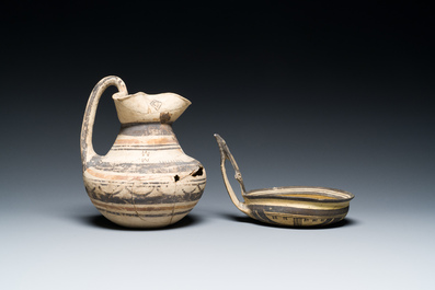 A polychrome Greek pottery 'oinochoe' ewer and a geometrically decorated Daunian pottery bowl, Southern Italy, 6th/3rd C. b.C.