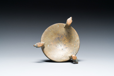A bronze tripod pricket candlestick, the Low Countries, 14/15th C.