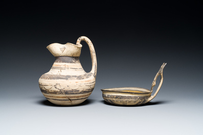 A polychrome Greek pottery 'oinochoe' ewer and a geometrically decorated Daunian pottery bowl, Southern Italy, 6th/3rd C. b.C.