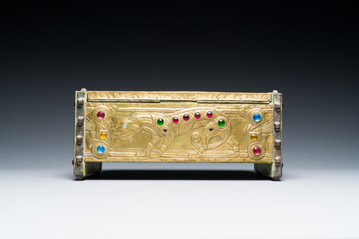 Alfred Daguet (Paris, 1875-1942): A Gothic revival repouss&eacute; brass and copper-mounted metal box with glass cabochons, dated 1907