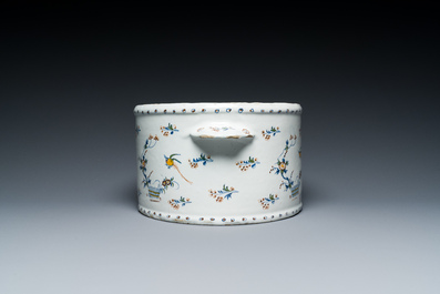 A polychrome Brussels faience cooler with '&Agrave; la haie fleurie' decoration, 18th C.