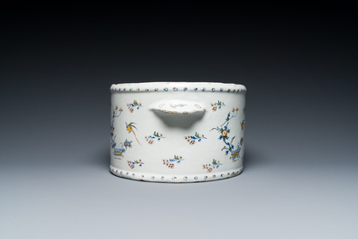 A polychrome Brussels faience cooler with '&Agrave; la haie fleurie' decoration, 18th C.