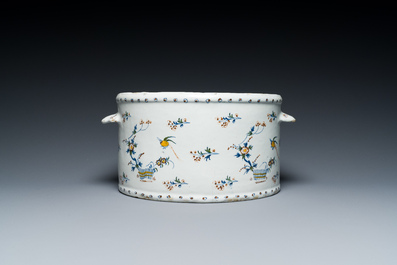 A polychrome Brussels faience cooler with '&Agrave; la haie fleurie' decoration, 18th C.
