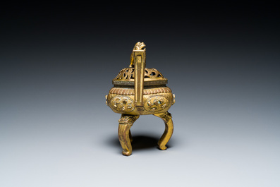 A Chinese gilt bronze tripod censer, 18/19th C.