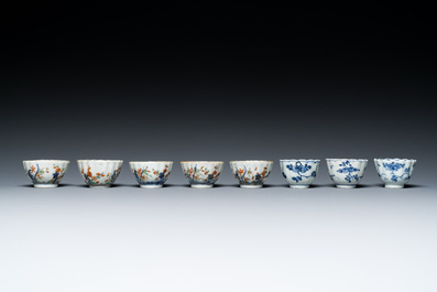 Two Chinese blue and white plates, three cups and saucers and five famille verte cups and saucers, Kangxi