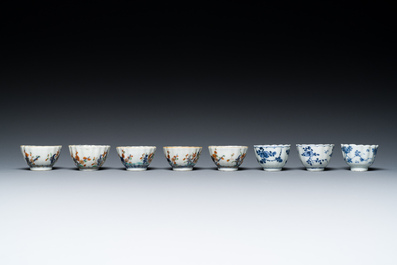 Two Chinese blue and white plates, three cups and saucers and five famille verte cups and saucers, Kangxi