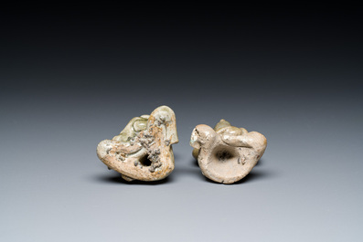 A Vietnamese or Annamese blue and white dish, a Thai Sawankhalok dish and a pair of celadon figures, 14th C. and later