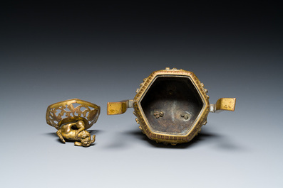 A Chinese gilt bronze tripod censer, 18/19th C.