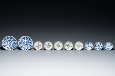 Two Chinese blue and white plates, three cups and saucers and five famille verte cups and saucers, Kangxi