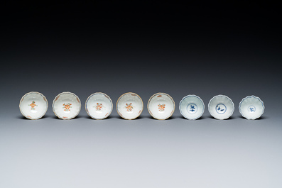 Two Chinese blue and white plates, three cups and saucers and five famille verte cups and saucers, Kangxi