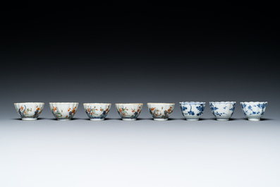 Two Chinese blue and white plates, three cups and saucers and five famille verte cups and saucers, Kangxi