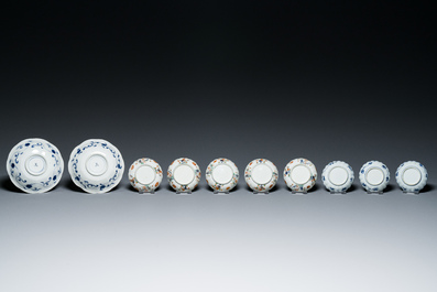 Two Chinese blue and white plates, three cups and saucers and five famille verte cups and saucers, Kangxi