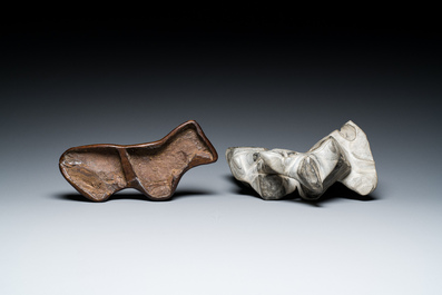 A Chinese grey lingbi stone scholar's rock on wooden stand, 19/20th C.