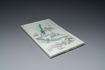 A Chinese rectangular famille rose tray with figures in a mountainous landscape, 19th C.